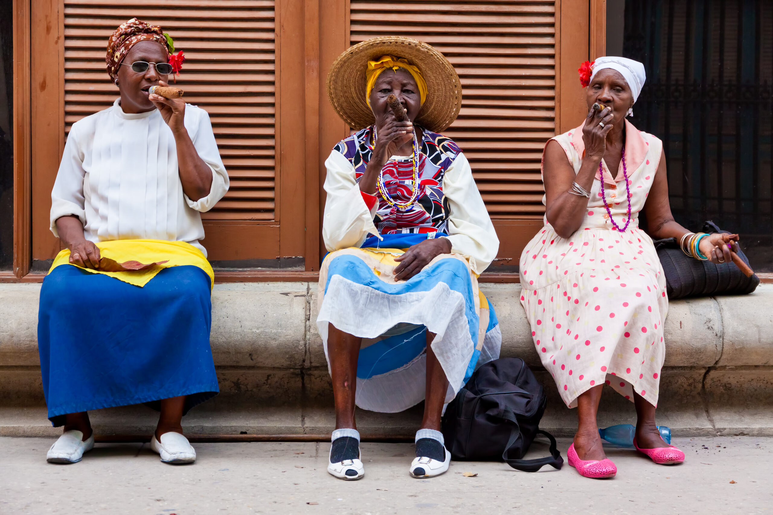 Ladies of Cuba smoking Juicy Cigars 